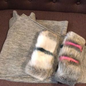 Grey mock turtle neck with faux cuffs .